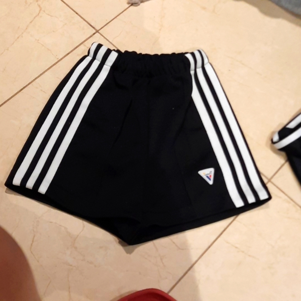 AUTHENTIC VARSITY PROFESSIONAL CHEERLEADER UNIFORM SHORTS KIDS LARGE BLACK WHITE